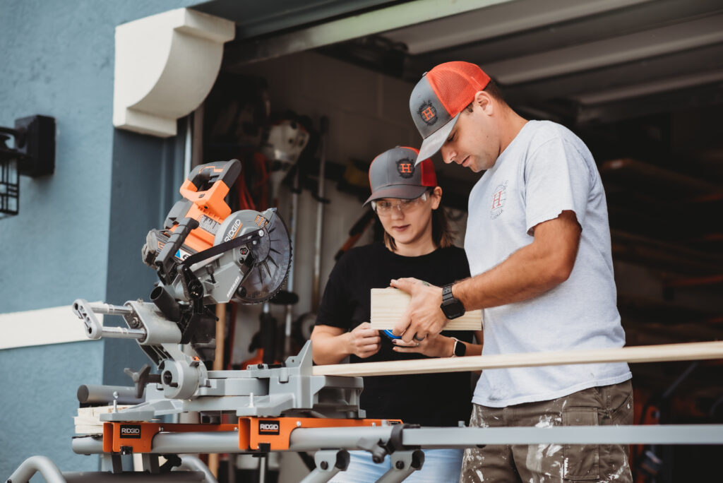 Ali and Steven using a miter saw